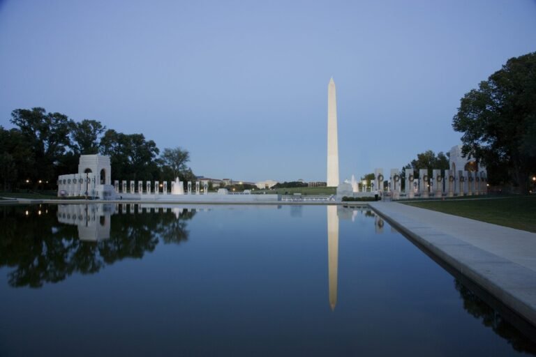The Washington Monument reflected in the Reflecting Pool at sunset, one of the best free things to do in Washington DC